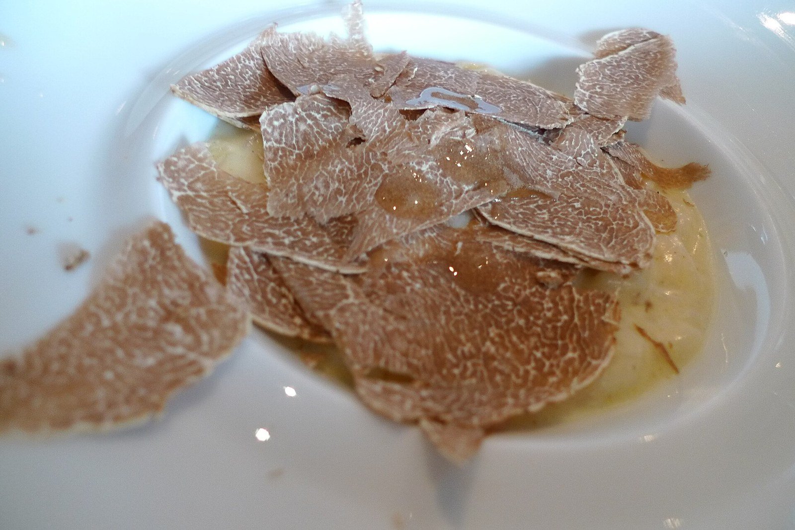Risotto con lamelle di Tartufo Bianco d’Alba, fotografia gastronomica illustrativa